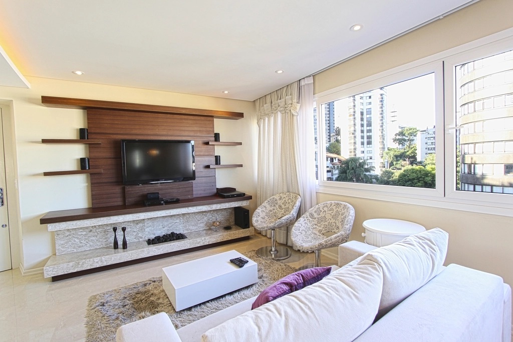 A furnished living room with city views